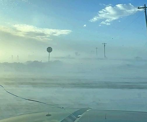 This photo taken by Zach Hunnicutt as he waited out Thursday’s snow squall on 8th Road north of Giltner shows conditions as the storm began to pass by. Hunnicutt had waited in his vehicle for nearly 40 minutes for this moment so he could see to drive again.