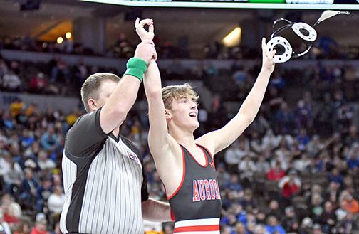 Logan Svoboda was all smiles as his hand was raised Saturday, rallying from a semifinal loss the night before to finish third at the state wrestling championships, the best finish in school history for a freshman. 