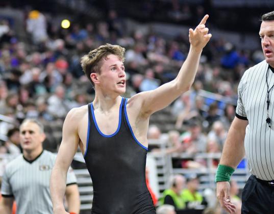 Lance Russell finally earned a state wrestling medal and will compete in Friday night's semifinals. 