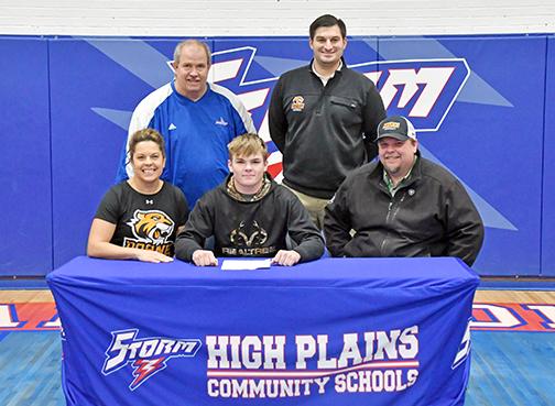 Wyatt Urkoski signed a letter of intent to play football at Doane University Feb. 22. Urkoski was joined by his parents, Kevin and Shelly, HPC football coach Greg Wood and Doane football coach Jonathan Johnson. 