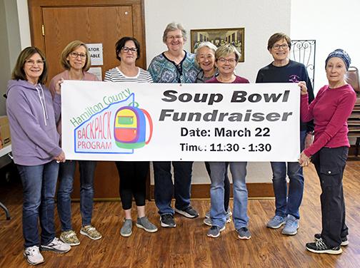 Volunteers from the Hamilton County Backpack Program have been busy preparing for Friday’s Soup Bowl Fundraiser. From left are Pam Emahizer, Jo Gilson, Jeanne Robertshaw, Beth Andrews, Jan Dick, Pat Pickering, Diana Shaffer and Lynda Ochsner. Not pictured, Shelly Maul, Verda Friesen, Loree Moss, Becky Kliewer, Claire Frevert, Mardell Jasnowski and Pastor Rudy Flores.
