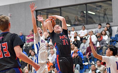 Maddix Fuhrman (34) was tough to defend for Walthill, scoring 12 points on six of seven shooting, but the Blujays got the last laugh on its home floor with a 73-52 win Feb. 27 in the D2-4 district final. 