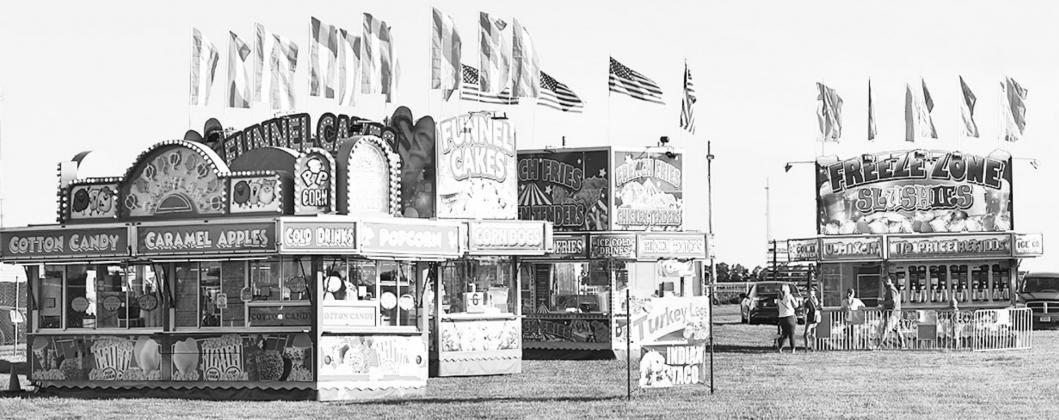 Though DC Lynch did not bring its carnival to this year’s fair, the company did provide several food booths. News-Register/Kurt Johnson