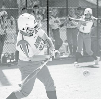 Courtney Oswald gets ahold of a pitch during Aurora’s 13-2 win over St. Paul. News-Register/Richard Rhoden