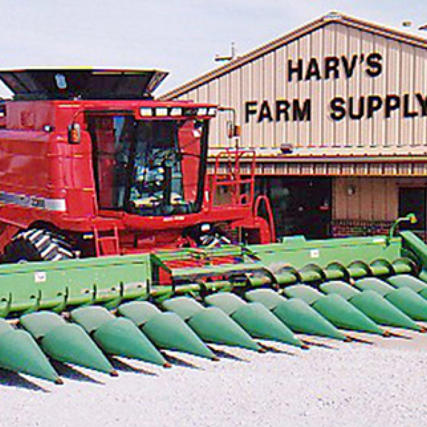   A Case IH 2388 combine with a John Deere 1293 corn head is shown outside the Bish Enterprises shop in this photo from the late 1990s to early 2000s. (Bish Enterprises photo)  