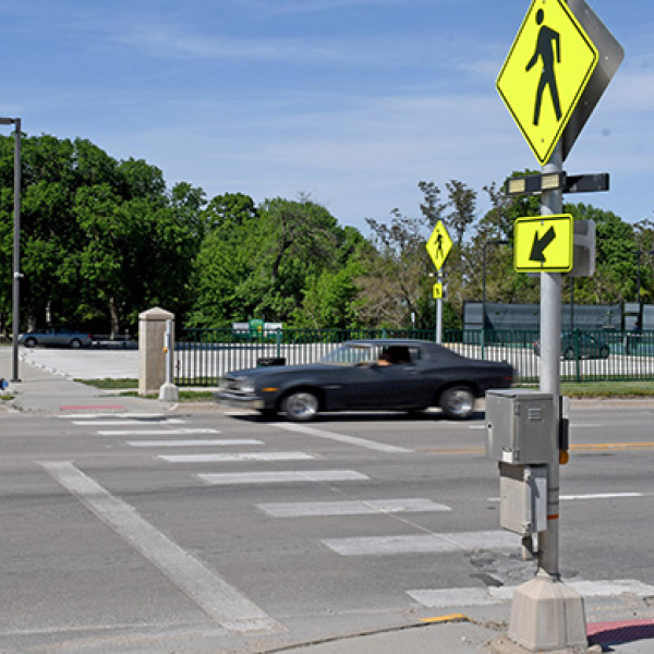 With the speed limit set at 35 mph on that stretch of Highway 34, Aurora Police Chief Paul Graham urges children and adults crossing the highway on the way to the Aurora Aquatic Center this summer to use caution and cross wisely. He offered similar advice to drivers, saying that if the yellow caution lights are flashing and a pedestrian is waiting to cross, it is a traffic violation to proceed through the crossing. 