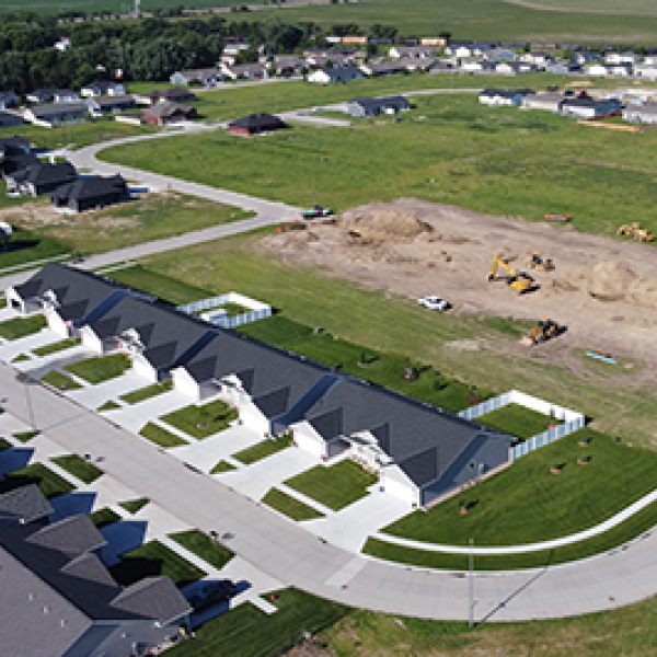 This drone photo taken last week shows the many single-family dwellings and duplexes that have been constructed in the Streeter Subdivision in the last three years. Also visible is a new street being built, which will access more lots in the recently annexed Streeter 7th Addition.