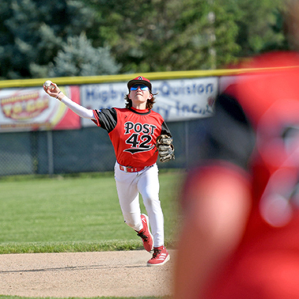 Kyson Phillips fields a grounder and makes the throw to first baseman Tate Bendorf during Aurora’s loss to York last week. 