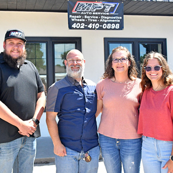 Pictured above from left are the new owners of MPT Auto Service, Tristen Evans and Colt Salmon. To Salmon’s right are his wife Jasmin and their daughter Zoe.