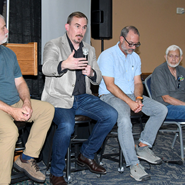 The Grain Place Foundation hosted its annual Field Day Saturday, which included three keynote speakers, all of whom participated in a panel discussion at the end. Pictured from left are: Chris Helzer with the Nature Conservancy, Dr. Jesse Bell, KSU sociology professor Matthew Sanderson and Grain Place Farms founder Dave Vetter.