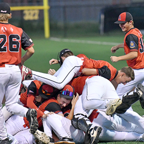 The Aurora Cooperative Juniors team celebrates after defeating York 8-6 to win the Class B Area 4 championship at Levitt Stadium last week. 
