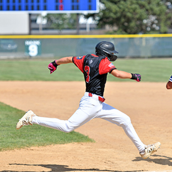 Landen Hansen tries to leg out a hard hit ball through the infield during Aurora’s 11-2 loss to Alliance at the Class B state tournament in Wayne July 20. 