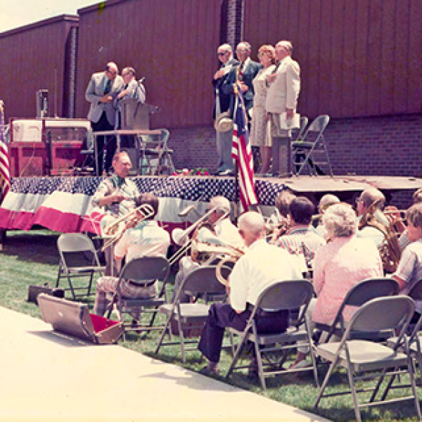 The Hamilton County Community Band performs the National Anthem at the opening ceremony of the Plainsman Museum on July 4, 1976. 