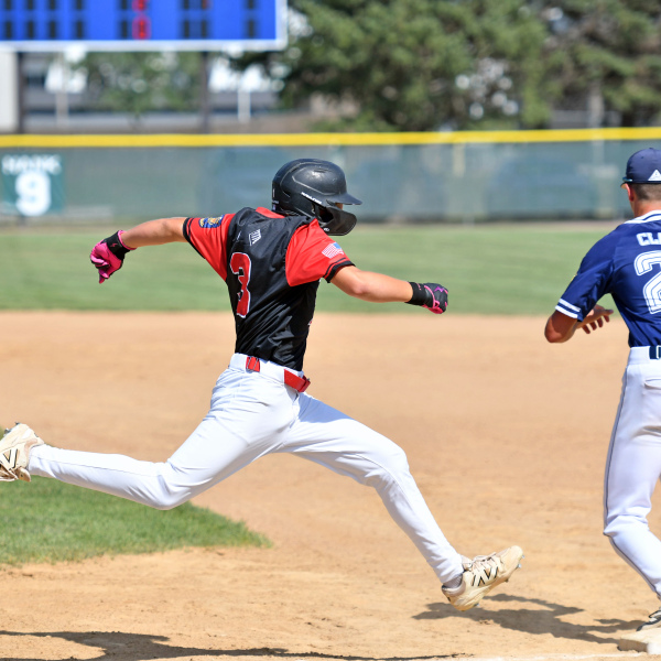 Landen Hansen hustles out a grounder during Aurora's 11-2 loss to Alliance Monday at the Class B American Legion state tournament in Wayne. 