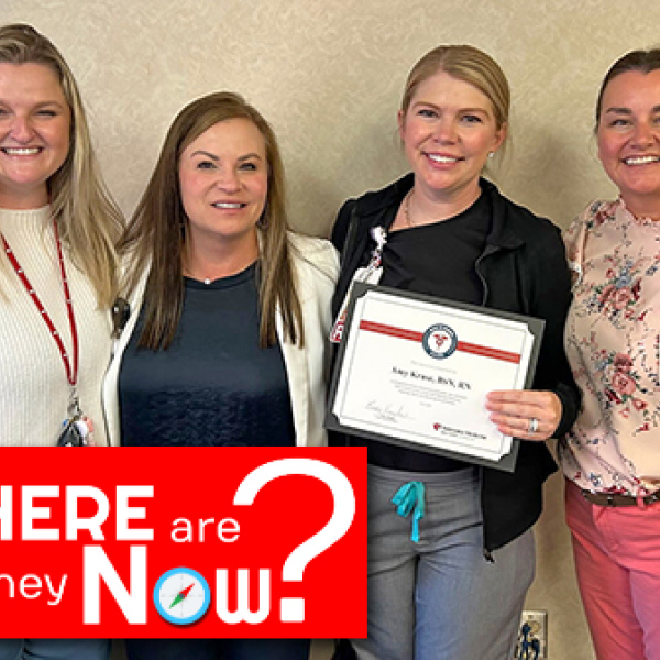 Aurora native Amy Kruse (holding certificate) was recently presented with the Image of Nursing Award at Nebraska Medicine.