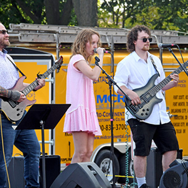 The 2026 season of Bands on the Bricks concluded Friday night with a performance by Maddog and the Bone Fetchers. Pictured from left: Carlos Vargas, Maddy “Maddog” Baker and Taygun Rothchild.