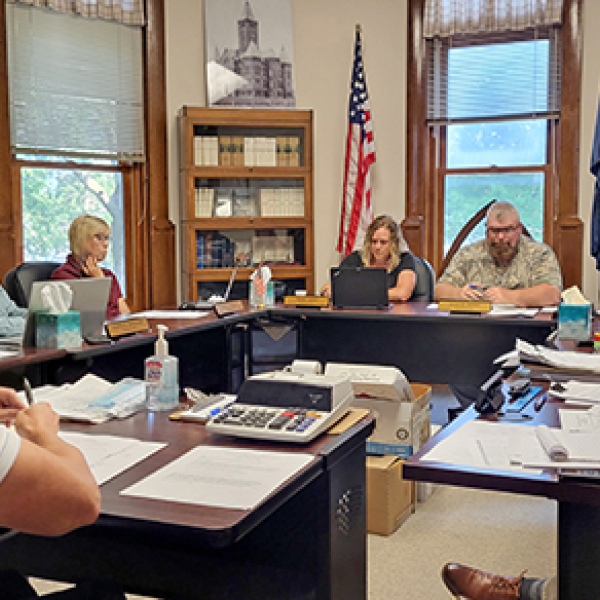 Aurora City Administrator Adam Darbro speaks to the Hamilton County Board of Commissioners on Monday to ask for an increase in the EMS subsidy for FY 2026-27. 