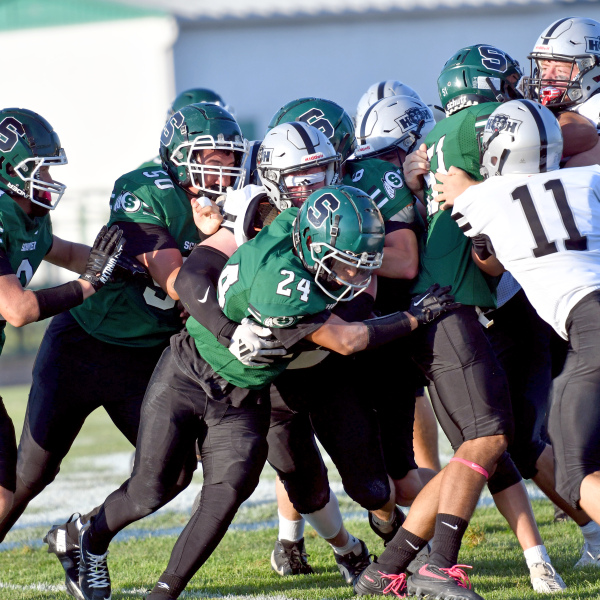 The H&H Bearcat defense pitched a shutout in its first-ever 11-man football game, downing Schuyler 43-0. 