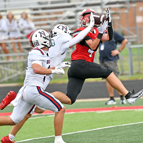Aurora senior Kash Kleinschmidt hauled in two touchdown catches as the Huskies downed Norris 30-21 Saturday afternoon. The game was postponed from Friday night to Saturday afternoon after rain and lightning continued throughout the night hours Friday. 