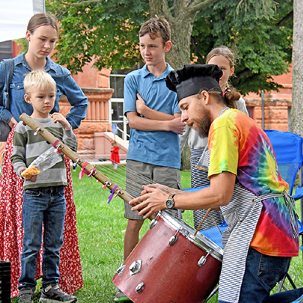 Art Walk Aurora featured over 30 artists at the Hamilton County Courthouse lawn on Sunday with patrons of all ages getting a chance to see and buy the various art pieces on display. Casey Hollingsworth, the inventor of The Music Kitchen, showcases an instrument he made inspired by the Kora, a stringed instrument traditionally made in West Africa.