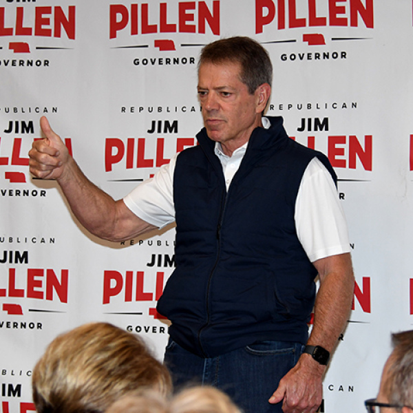 Republican incumbent Gov. Jim Pillen invited local supporters to consider becoming “a blackshirt” during his campaign stop in Aurora last week, which would involve encouraging 11 people to get out and vote in the Nov. 3 General Election.