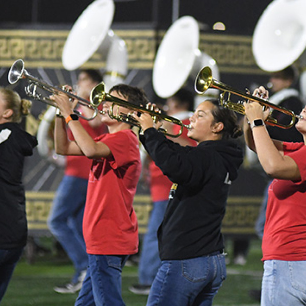 Pictured above performing Friday at halftime of the Northwest game are, from left, Violet Carstensen, Shaun Williams, Avery Miller and Lucy Johnson.
