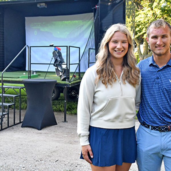 Grayce (Gustafson) and Connor Smith have started their latest business, Cross Swing Golf, offering a mobile golf simulator that can be brought in for after-school dances, corporate events, weddings and more.