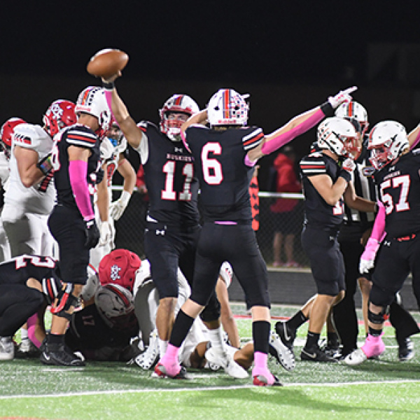 Malaikai Camacho holds up the ball after recovering a third-quarter Bison fumble, leading to a 34-7 win. The Huskies finished plus-five in turnover margin during the 2026 regular season. 