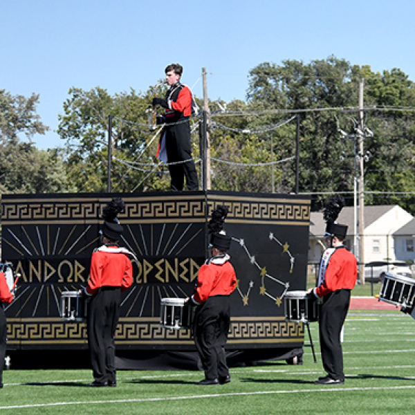 Many spectators were drawn by the visuals as much as Pandora’s Box as Aurora performed at Harvest of Harmony. That afternoon, the band took home its first superior of the season in the Class B field show. Pictured performing in the field show are from left: Ashlyn Yockey, Kinslea Johnson, Landrie Champion and Lucy Johnson.