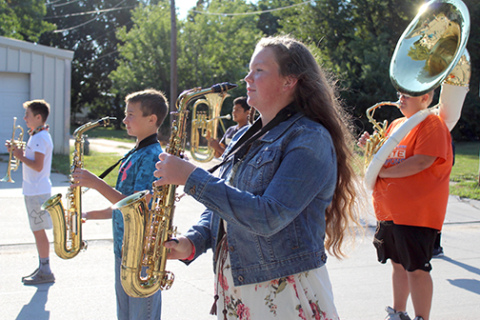 From left, Haden Helgoth, Hudson Urkoski, Allie Howell and Kaden Rieken stand in formation during marching practice. Courtesy photo