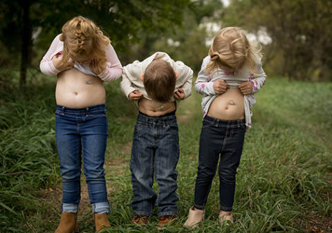 All three of Eric and Tanya Sabata’s children were born at less than four pounds. Pictured at top (top-down) are Rowan, Knox and Makinlee Sabata. Above: All three of the children utilize feeding tubes to help them get nutrients. Courtesy photos