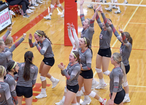 Aurora celebrates after defeating GINW in five sets. 