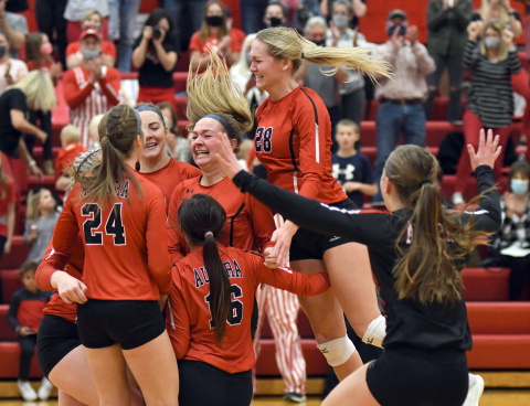 Aurora celebrates after qualifying for its first state tournament since 2016. 