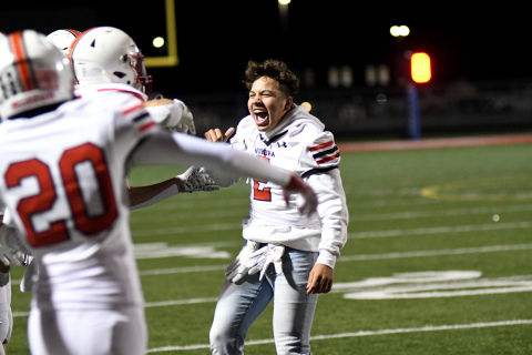 Carlos Collazo (2) celebrates with his teammates after the Huskies defeated Norris on the road Friday night. 
