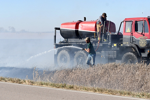 Ditch fire near Marquette.