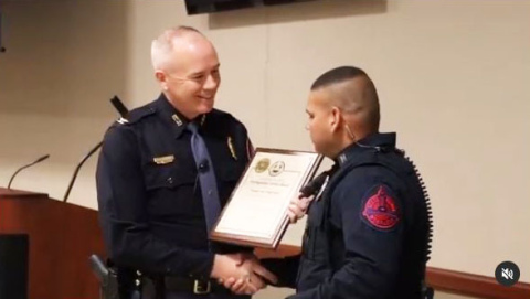 Colonel John Bolduc (left) presents Trooper Ravi Singh with the Superintendent Distinguished Service Award.