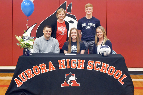 Cassidy Knust signed her letter of intent with Concordia University with her parents, Troy and Cami as well as brother Drew and Aurora coach Lois Hixson. 