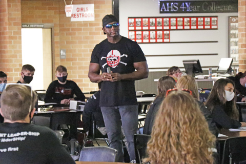 DeMoine Adams tells Aurora High School Junior Leadership Academy students that leadership is the new cool.