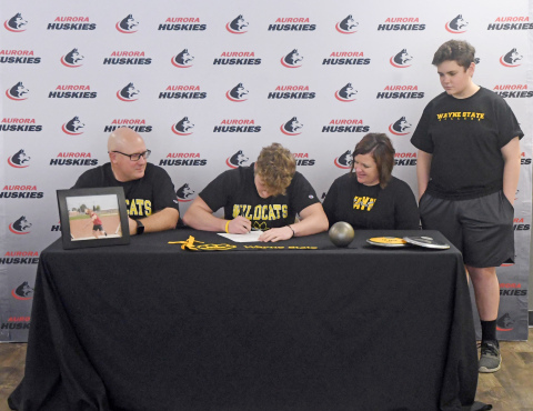 Aurora senior Daniel Elge signed a letter of intent to participate in track and field at Wayne State College. 