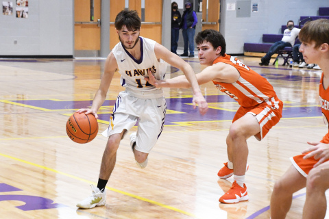 Tyrone Capek drives the lane during Hampton’s 53-31 loss to Osceola.