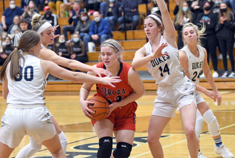 Aurora's Lexi Jones is surrounded by York defenders during a 53-31 loss to the Dukes Thursday. 