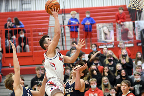 Aurora’s Jameson Herzberg scored 17 of his 19 points in the second half of the Huskies’ 45-43 win against York Monday night.
