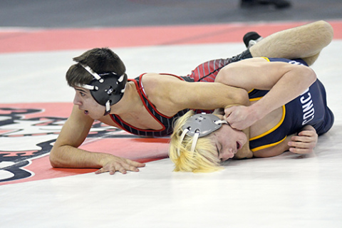 Jeremy Oswald scored his 100th career victory during the first round of the state wrestling championships Friday with a pinfall. 