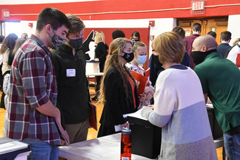 Mindy Shiehs with USDA and Keith Dubas with Central Community College answer questions during last week’s Connect the Dots program for Aurora freshmen.