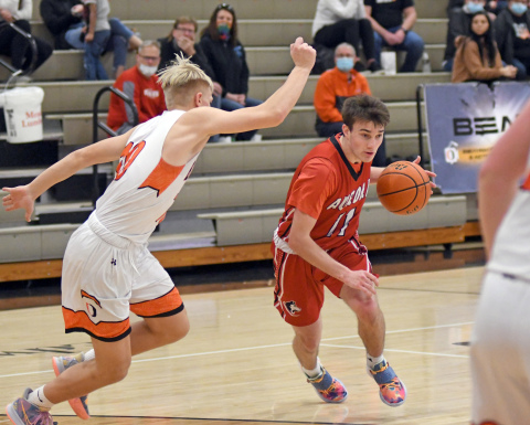 Andrew Bell drives the lane during Aurora's 39-36 loss to Beatrice in the B-6 district final Saturday. 