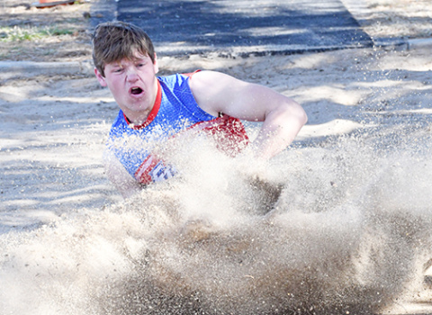 HPC’s Trevor Carlstrom was a runner-up finisher in the long jump event at his home invite last week. 