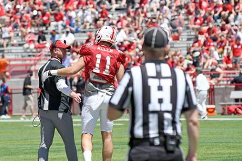 Former Husky Austin Allen and Nebraska coach Scott Frost share a light-hearted moment during Nebraska’s Spring Game Saturday.