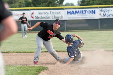 Jayden Quandt lays a tag at second during Aurora’s 7-5 loss to York. 