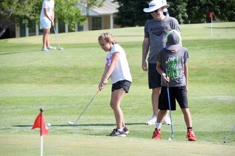 Pictured working with youth is Coach Craig Badura.