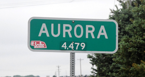 The sign posted on Highway 34 currently shows Aurora’s population at 4,479, though that is dated information. According to the 2020 Census, a tract including the city shows a population of 4,926. The report did not specifically break out Aurora’s total population.